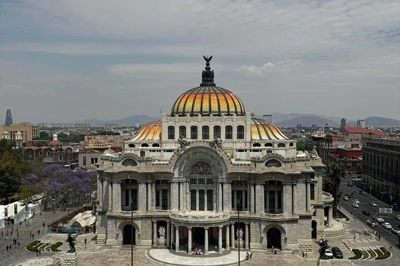 White marble and gold dome of the Palacio de Bellas Artes, the most iconic of museums in Mexico City