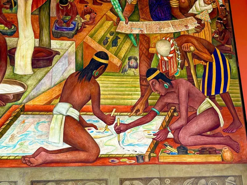 Diego Rivera's sweeping history mural on a staircase wall, a muralism highlight among museums in Mexico City