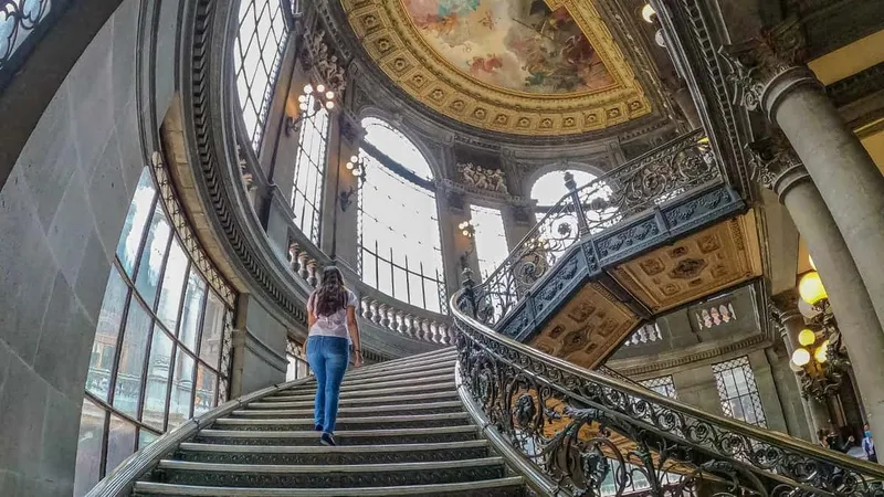 Ornate facade of the Palacio de Correos in the historic center, a walking route past museums in Mexico City