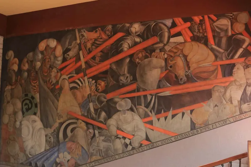Orozco frescoes covering the courtyard walls of San Ildefonso, birthplace of muralism among museums in Mexico City