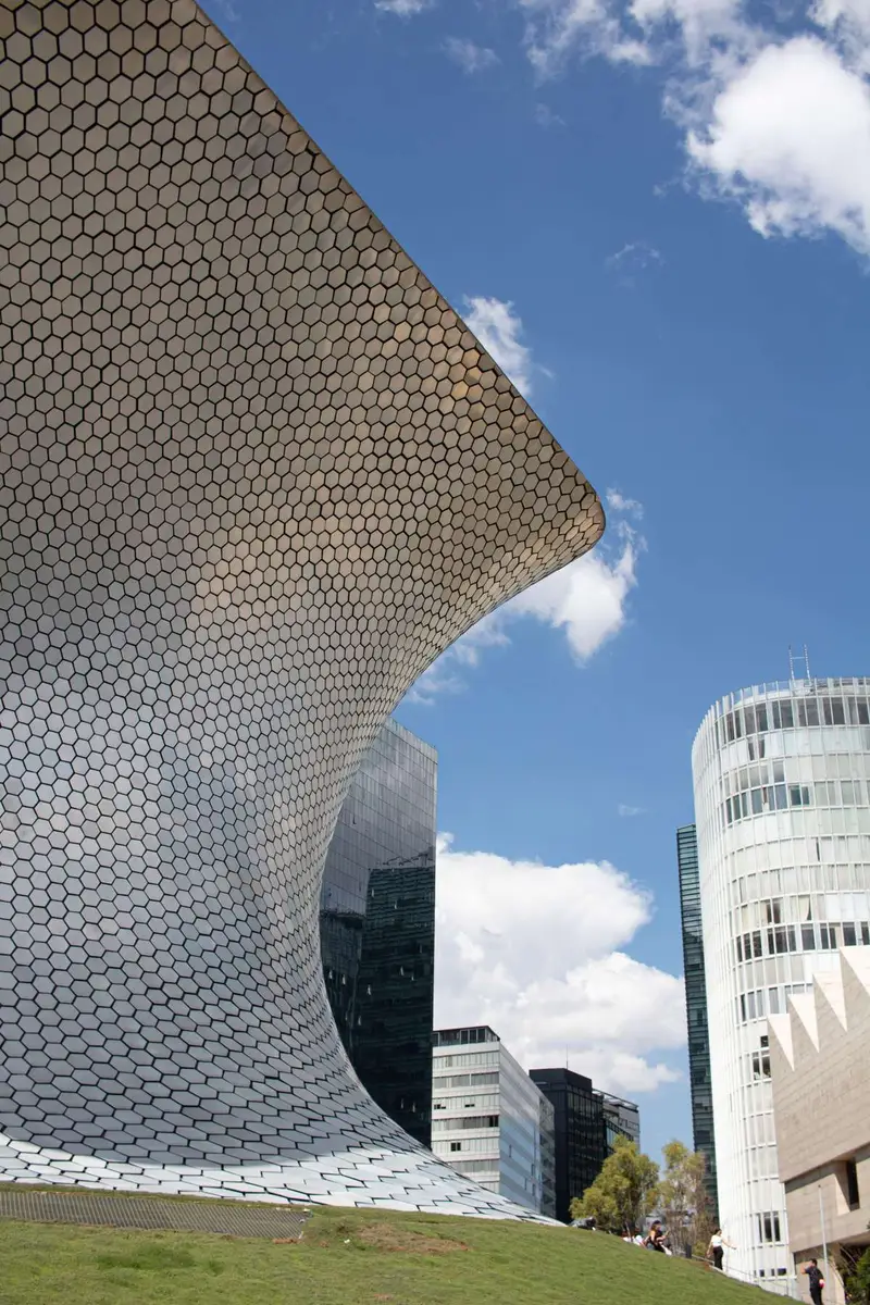 The shimmering silver hourglass facade of Museo Soumaya, a modern icon among museums in Mexico City, Polanco